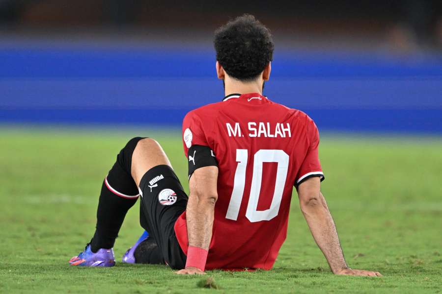 Egypt's forward #10 Mohamed Salah reacts after being injured