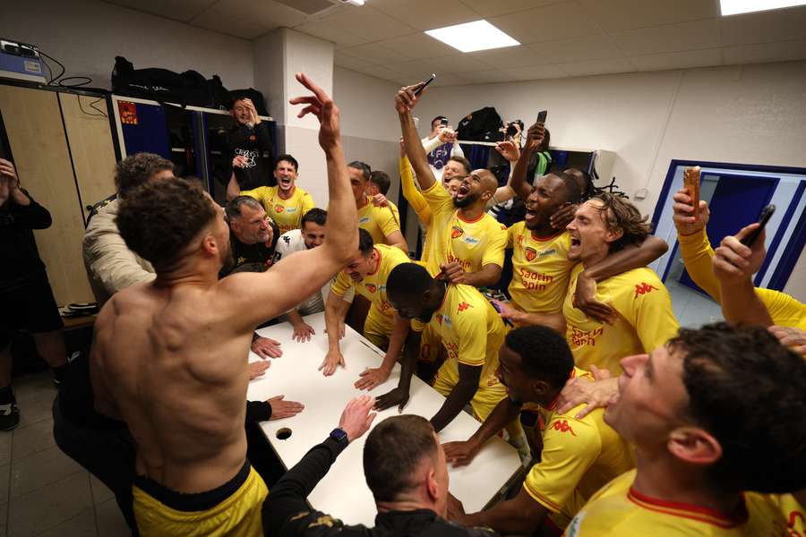 Le Mans players celebrate moving to the brink of promotion to Ligue 1
