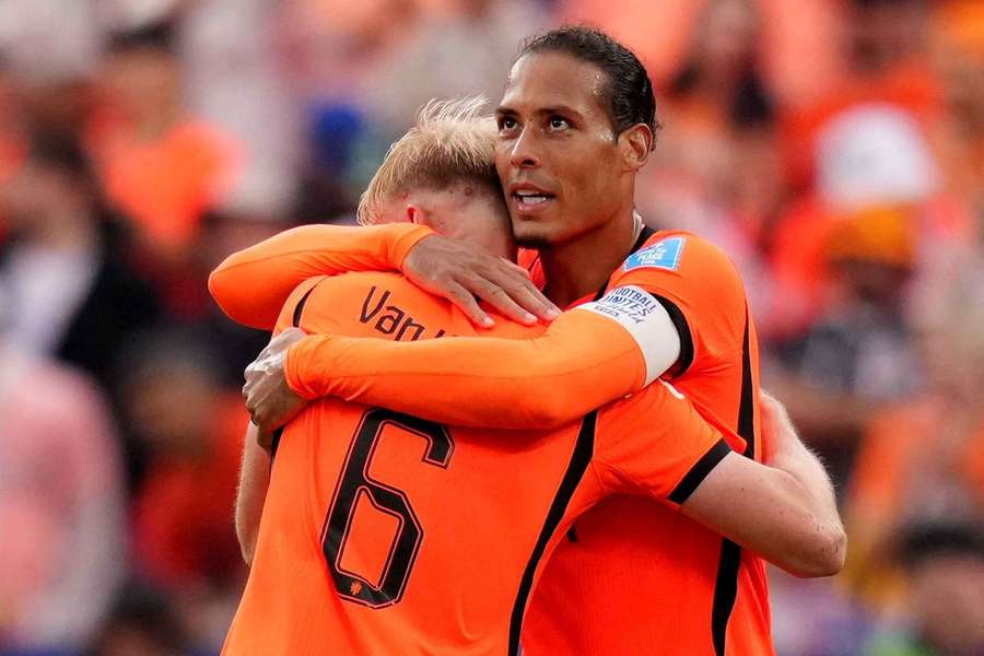 Netherlands' Virgil van Dijk celebrates after the match with Jan Paul van Hecke
