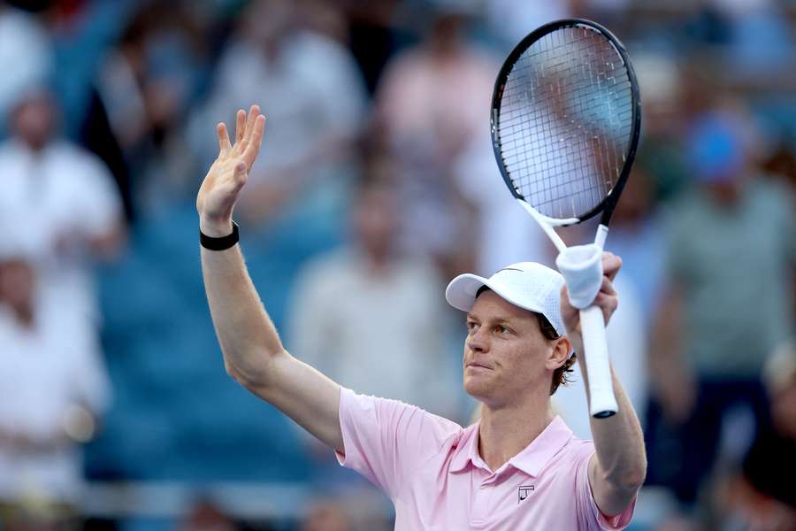 Jannik Sinner salutes the crowd after defeating Alex Michelsen at the Miami Open.