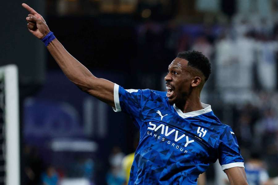 Al Hilal's Mohamed Kanno celebrates after Hamad Al-Yami scores their first goal