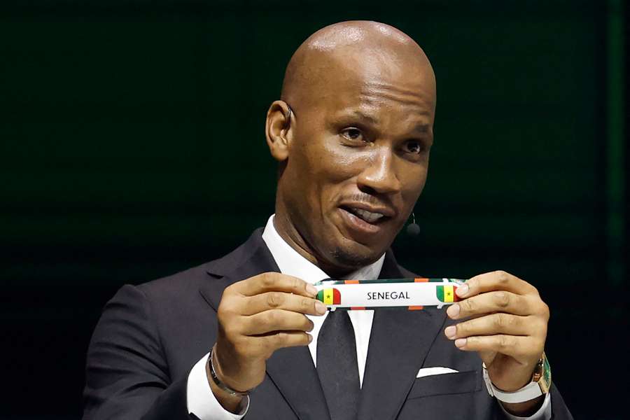 Former Ivorian footballer Didier Drogba helped conduct the draw