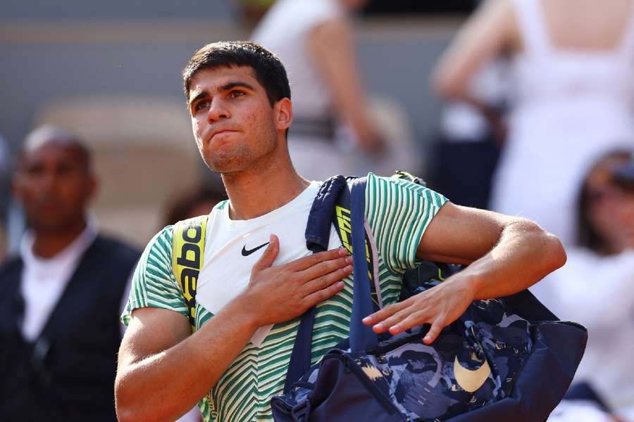 Spain's Carlos Alcaraz leaves court after losing his French Open semi-final match against Serbia's Novak Djokovic