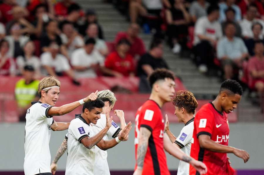 Erik of Vissel Kobe celebrates his goal during the match between Shanghai Port and Vissel Kobe