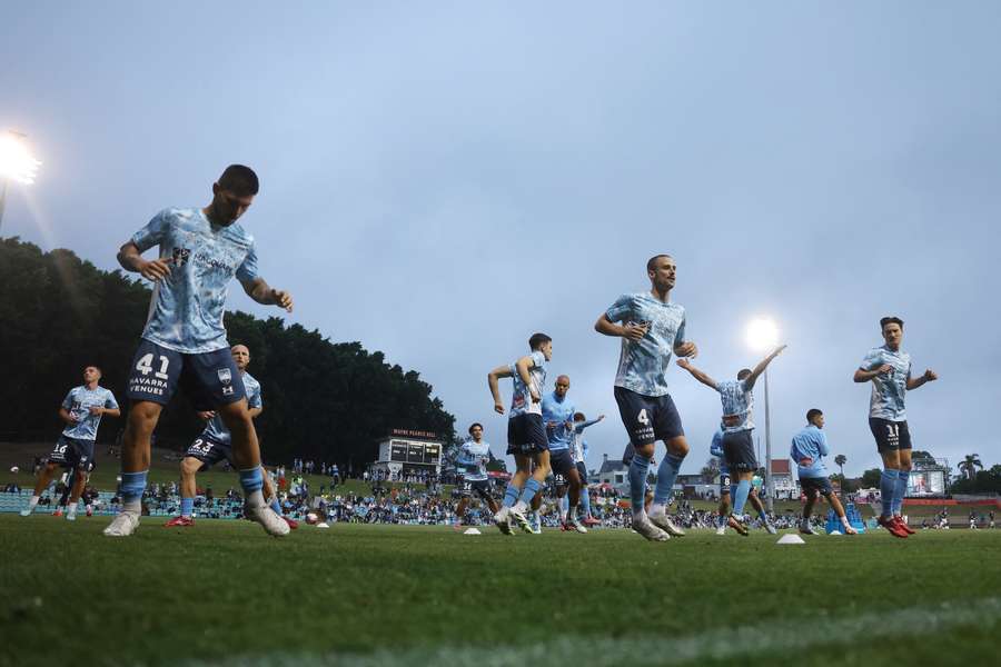 Sydney FC players warm up on Leichhardt Oval before their most recent game at the venue.