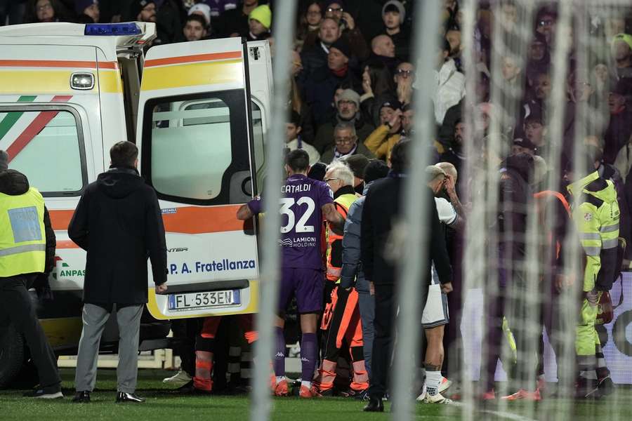 Bove was rushed away in an ambulance as players and fans looked on in horror 