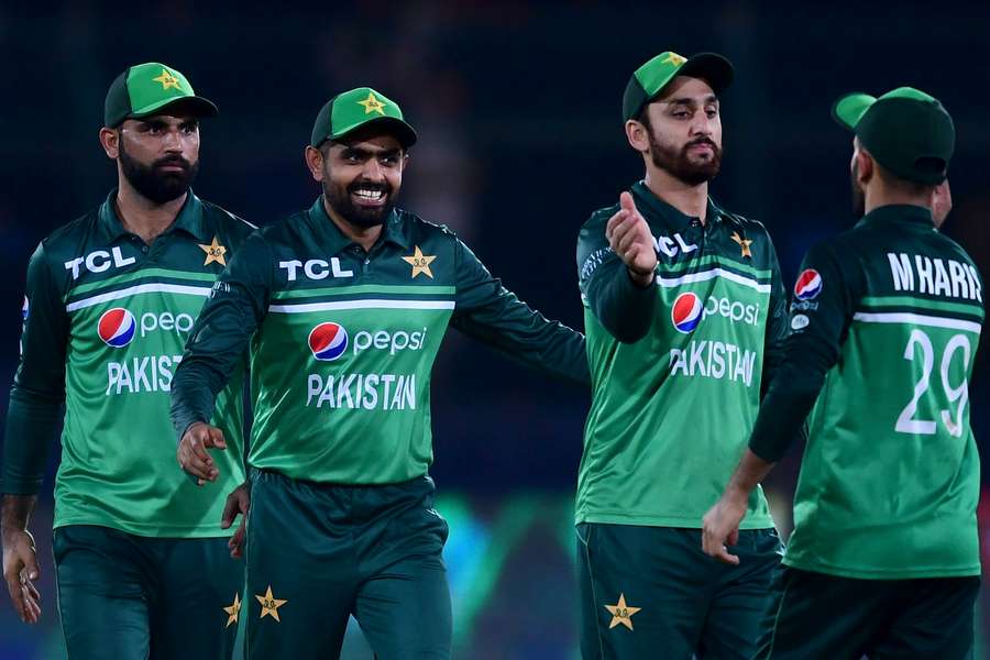 Pakistan's captain Babar Azam (2ND-L) and his teammates celebrate after winning the fourth ODI match between Pakistan and New Zealand