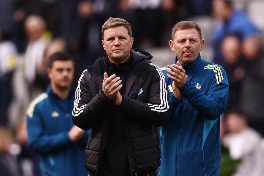 Eddie Howe applauds the supporters