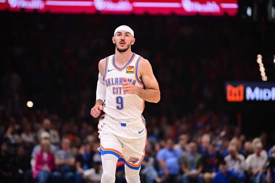 Alex Caruso jogging his way down the court