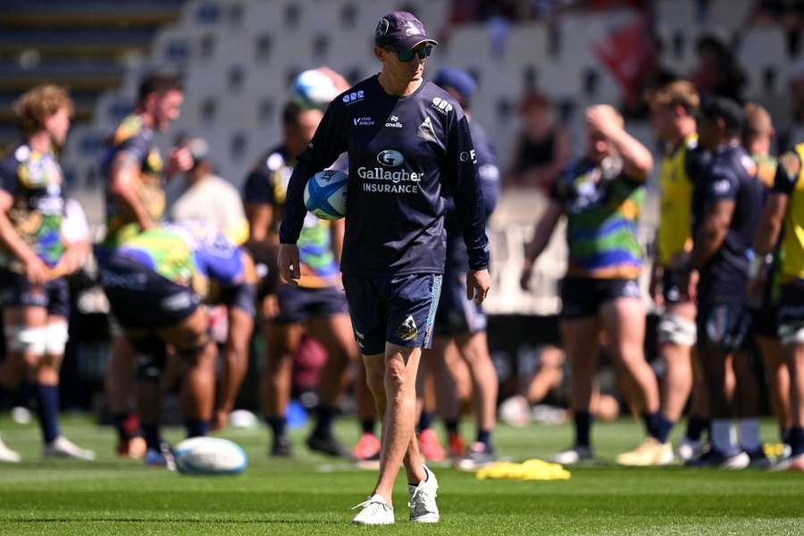 Stephen Larkham directs pre-game warm-ups before the Brumbies' historic away win in Christchurch. Stephen Larkham directs pre-game warm-ups before the Brumbies' historic away win in Christchurch.