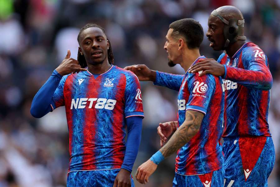 Eberechi Eze celebrates scoring Crystal Palace's opening goal with teammates Daniel Munoz and Jean-Philippe Mateta