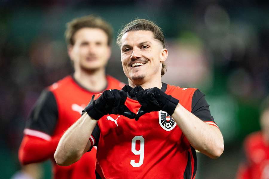 Marcel Sabitzer celebrates scoring the opening goal during a friendly football match between Austria and South Korea