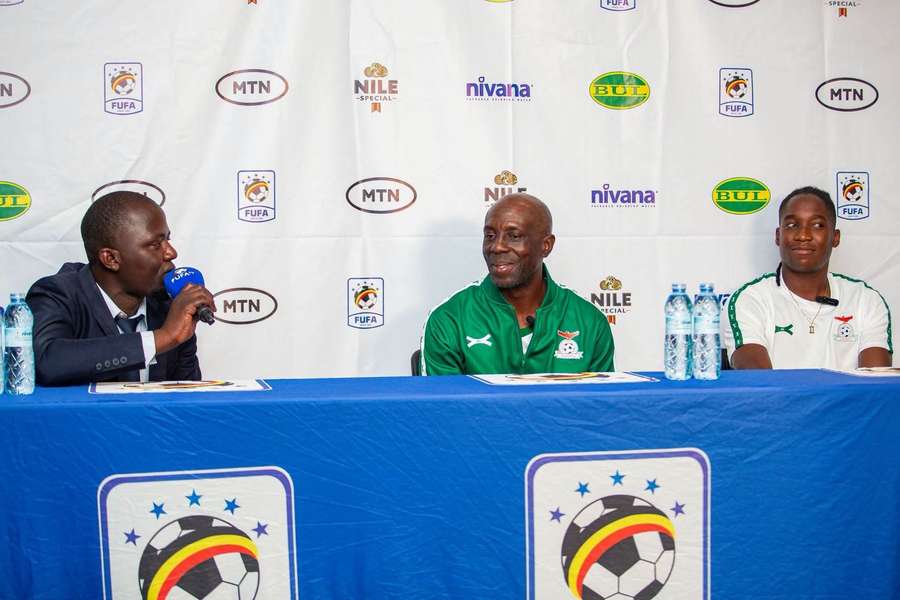 Zambia  interim coach Charles Haalubonob (centre) flanked by Barbra Banda during the interview
