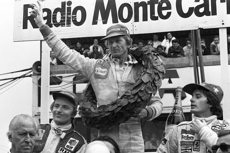 French Formula 1 driver Jean-Pierre Jabouille (C) celebrates his victory at the end of the Formula 1 Grand Prix de France in Dijon on July 1, 1979