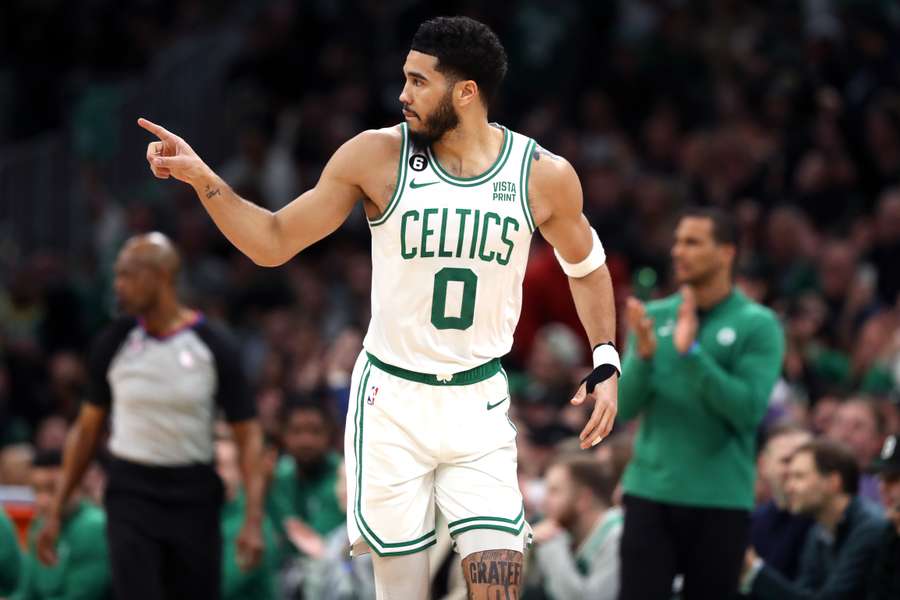 Jayson Tatum #0 of the Boston Celtics celebrates after scoring against the Brooklyn Nets