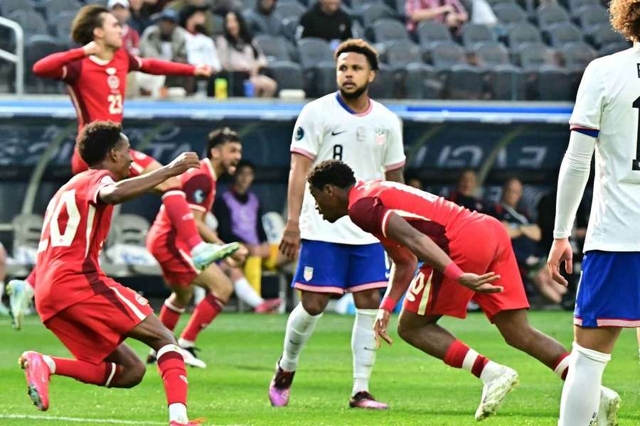 Jonathan David celebrates after scoring Canada's winner