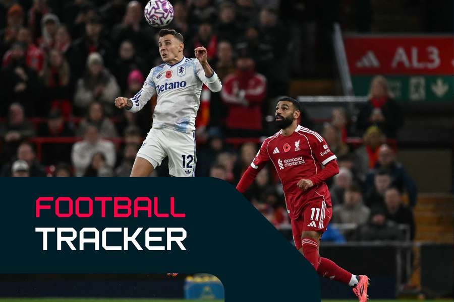 Lucas Digne heads the ball away from Mo Salah