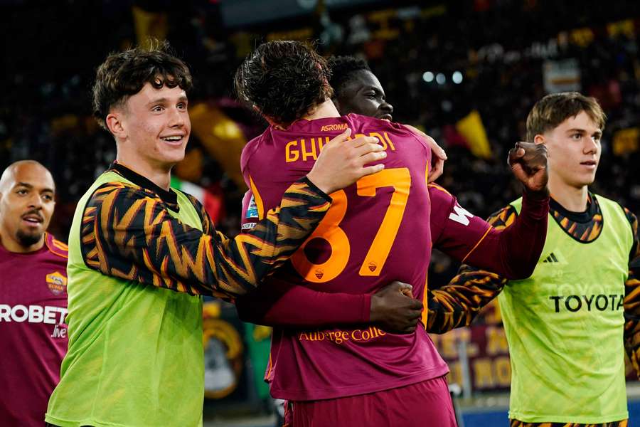 Roma's players celebrate their winner Roma's players celebrate their winner