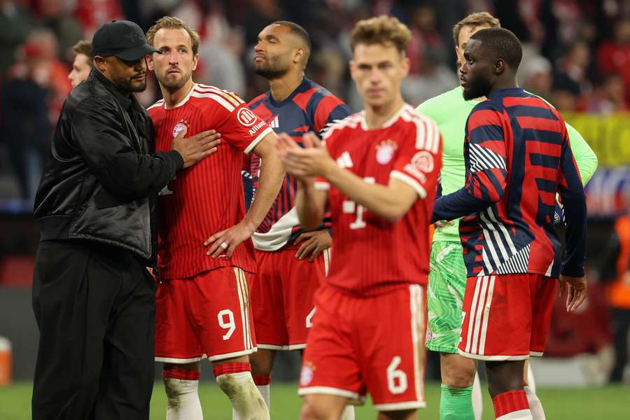 Vincent Kompany consoles Harry Kane after Bayern Munich's loss over the two legs