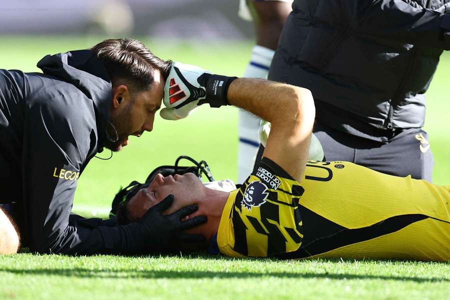 Martinez was stretchered off against Everton Martinez was stretchered off against Everton