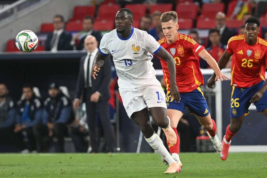 France's Ibrahima Konate is challenged by Spain's Dani Olmo