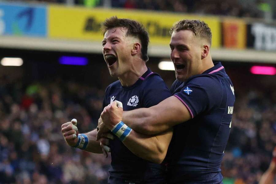 Scotland's George Horne celebrates scoring their seventh try with Duhan van der Merwe