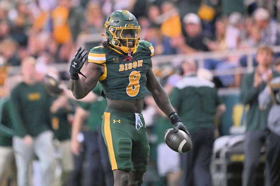 North Dakota State's running back Barika Kpeenu celebrates a touchdown North Dakota State's running back Barika Kpeenu celebrates a touchdown