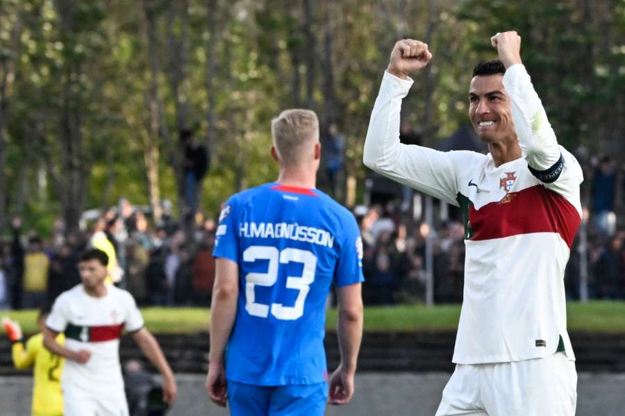 Ronaldo celebrates scoring his winning goal against Iceland