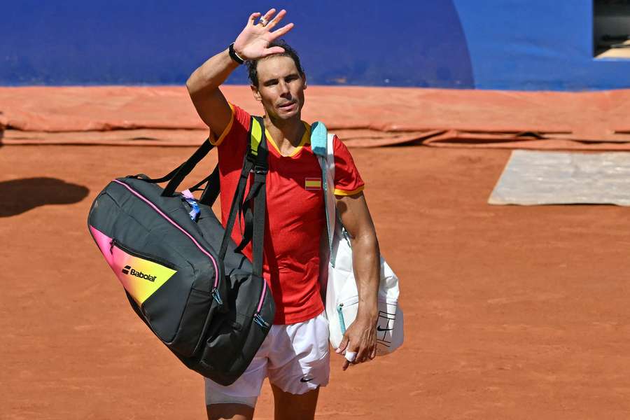 Rafael Nadal waves goodbye to spectators after his defeat to Novak Djokovic at the Paris Olympics on Monday