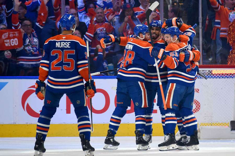 Oilers players celebrate after a first-period goal against the Vegas Golden Knights in Game 4 (2025 Stanley Cup Playoffs)