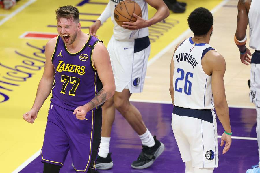 Doncic (left) in action for the Lakers