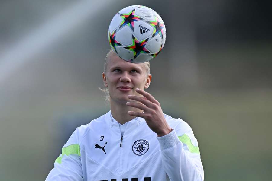 Manchester City's Norwegian striker Erling Haaland reacts as he takes part in a training session.