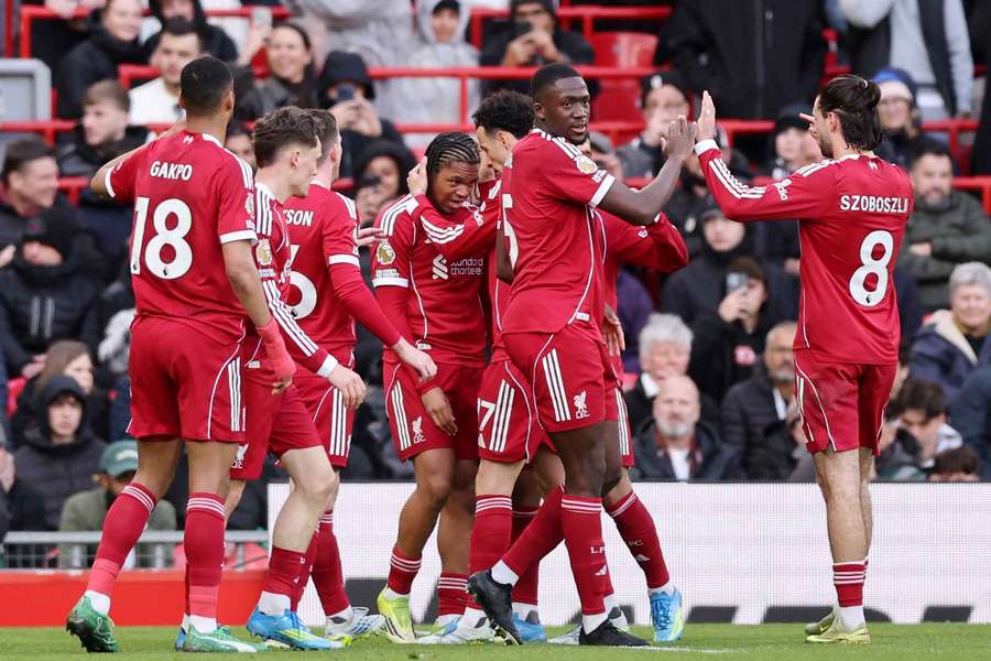 Liverpool's Rio Ngumoha celebrates scoring their first goal with teammates 