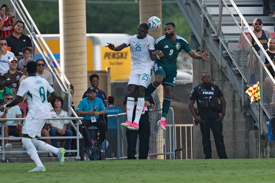 El Hadji Malick Diouf (left) and Feras Al-Brikan (right) battle for the ball in Saudia Arabia-Senegal friendly El Hadji Malick Diouf (left) and Feras Al-Brikan (right) battle for the ball in Saudia Arabia-Senegal friendly