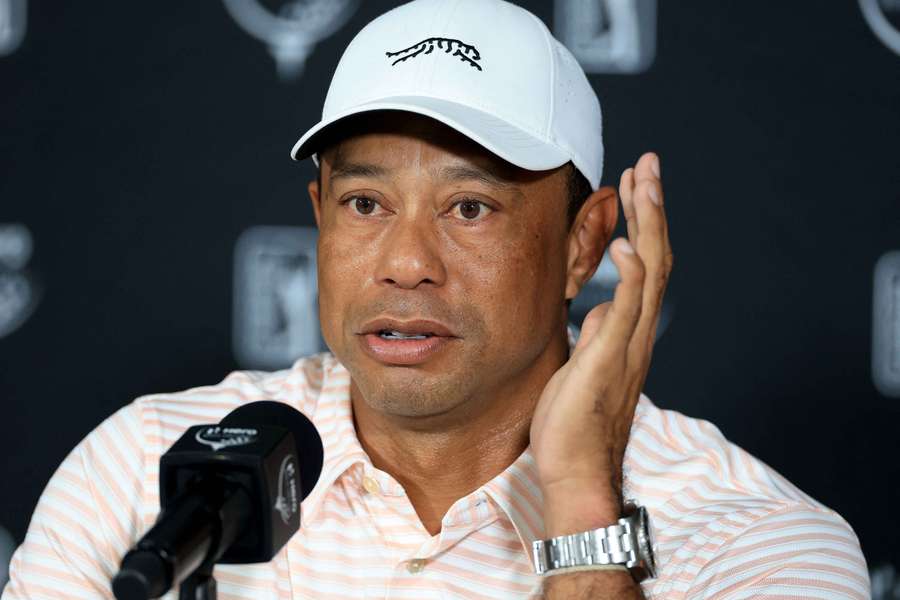Tiger Woods of the United States speaks to the media 
