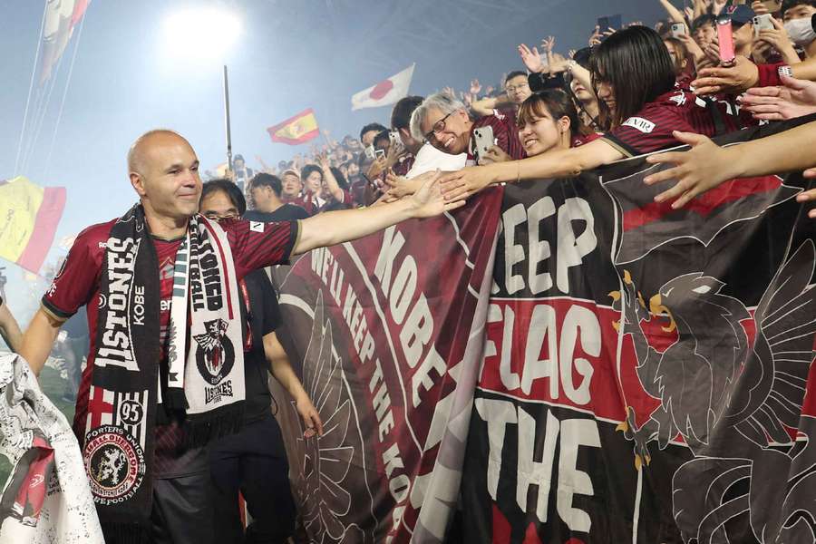 Andres Iniesta greets fans during his farewell ceremony at Vissel Kobe after their J-League match against Hokkaido Consadole Sapporo in 2023