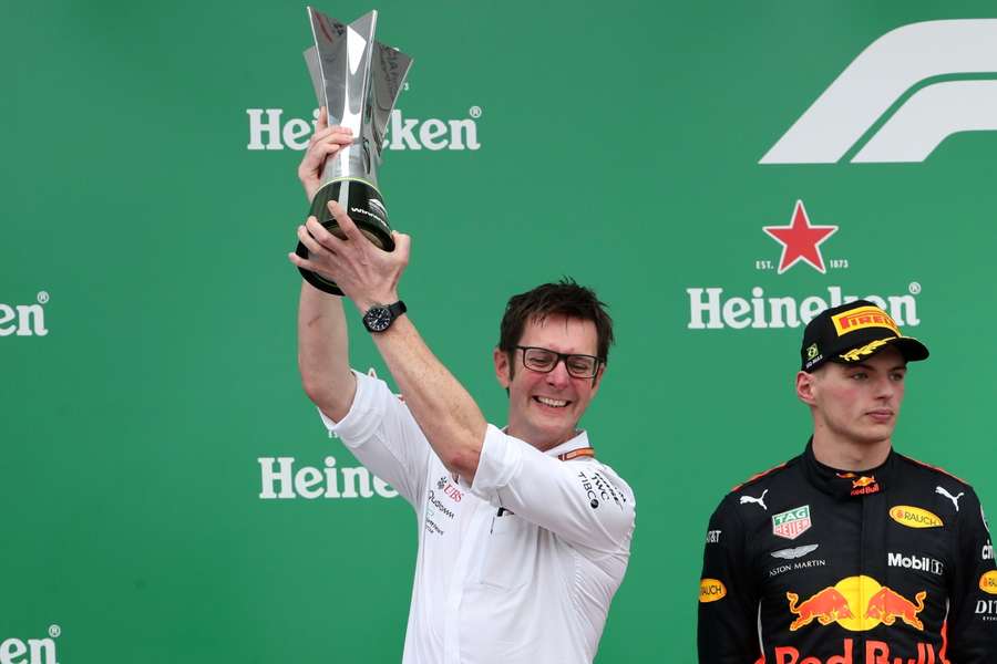 Mercedes Trackside Engineering Director Andrew Shovlin celebrates winning the constructors championship with the trophy