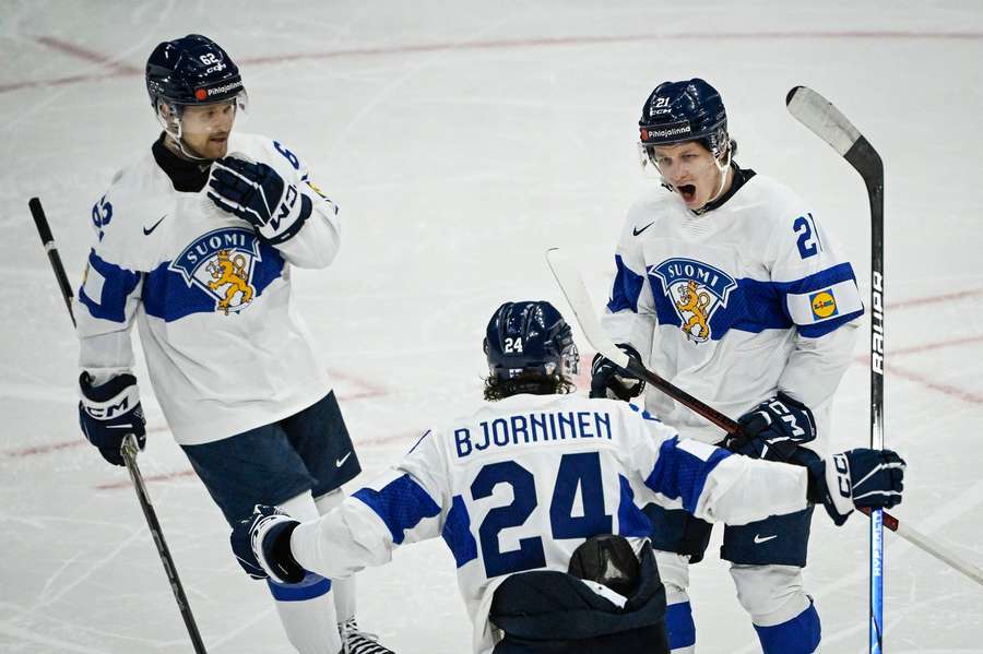 Patrik Puistola (right) celebrates his equalising goal for Finland