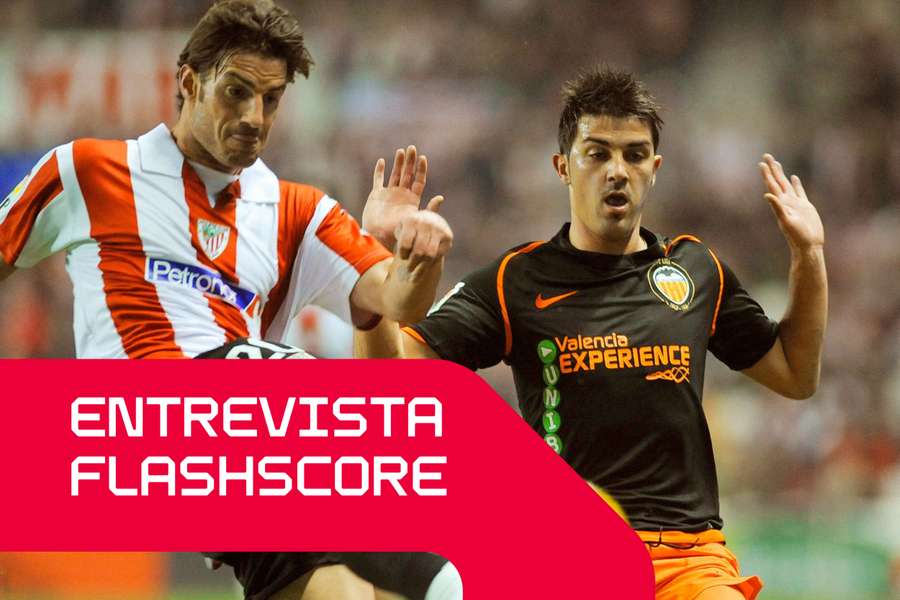 Aitor Ocio limpa uma bola na presença de David Villa