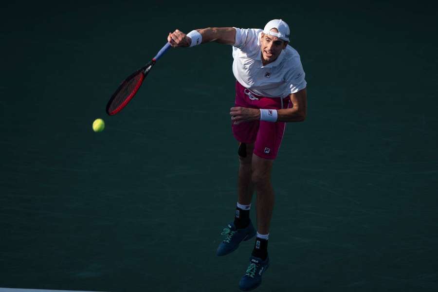 Frenchman survives John Isner's 28 aces