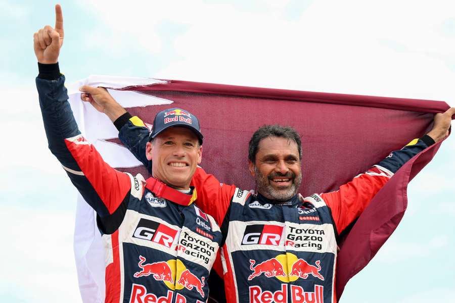 Co-pilotul Mathieu Baumel și Nasser Al-Attiyah (Toyota)