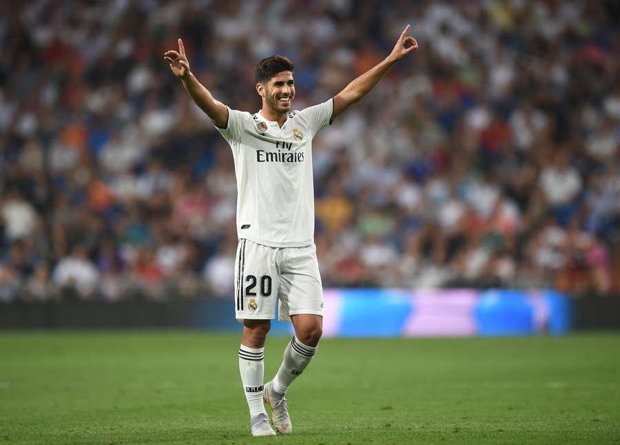 Marco Asensio célèbre son but sous le maillot du Real Madrid lors d'un match de Liga contre l'Espanyol Barcelone au stade Santiago-Bernabéu, le 22 septembre 2018.