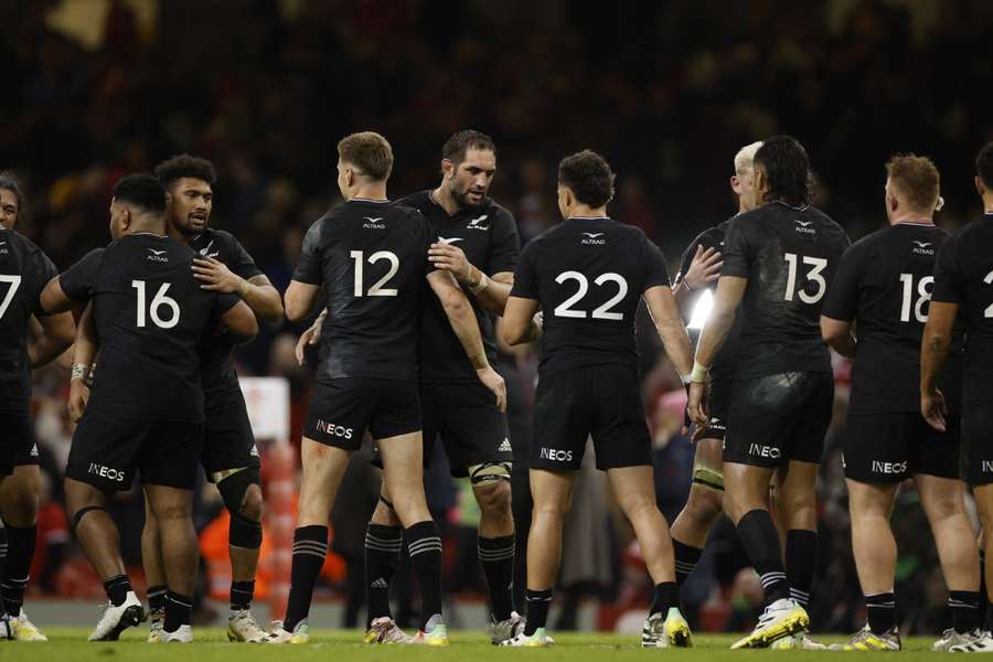 New Zealand players celebrate after the match