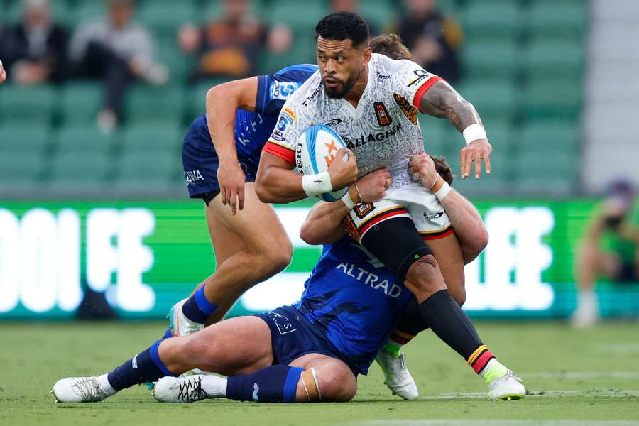 Etene Nanai-Seturo of the Chiefs gets tackled. 