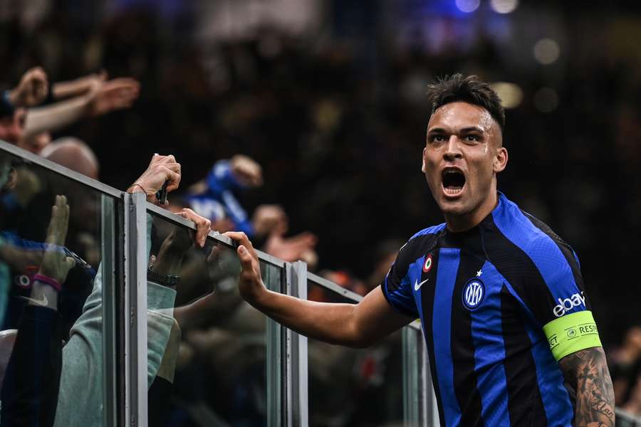 Inter Milan's Argentinian forward Lautaro Martinez celebrates after opening the scoring 