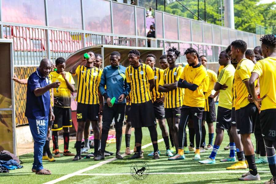 Sofapaka coach Robert Matano with his players