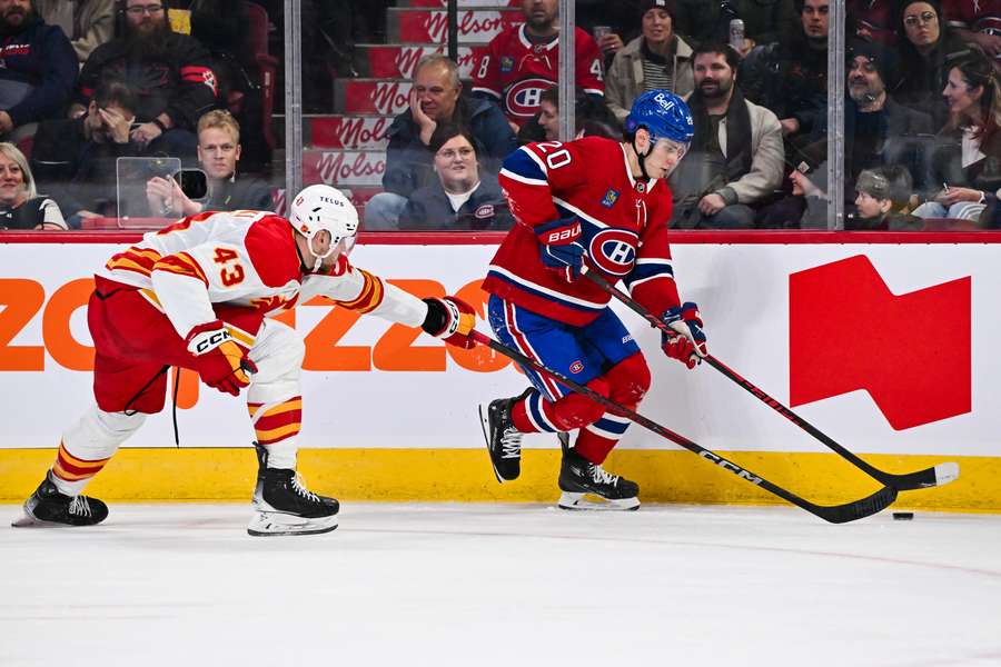 Slafkovský zaznamenal bod.