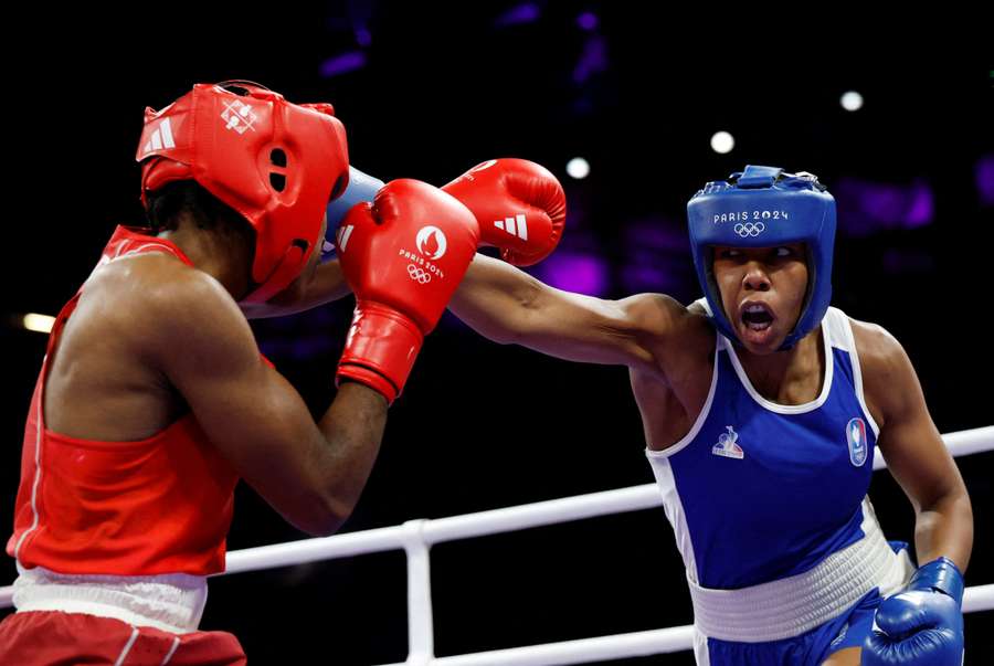 Davina Michel of France in action against Cindy Winner Djankeu Ngamba of Refugee Olympic Team