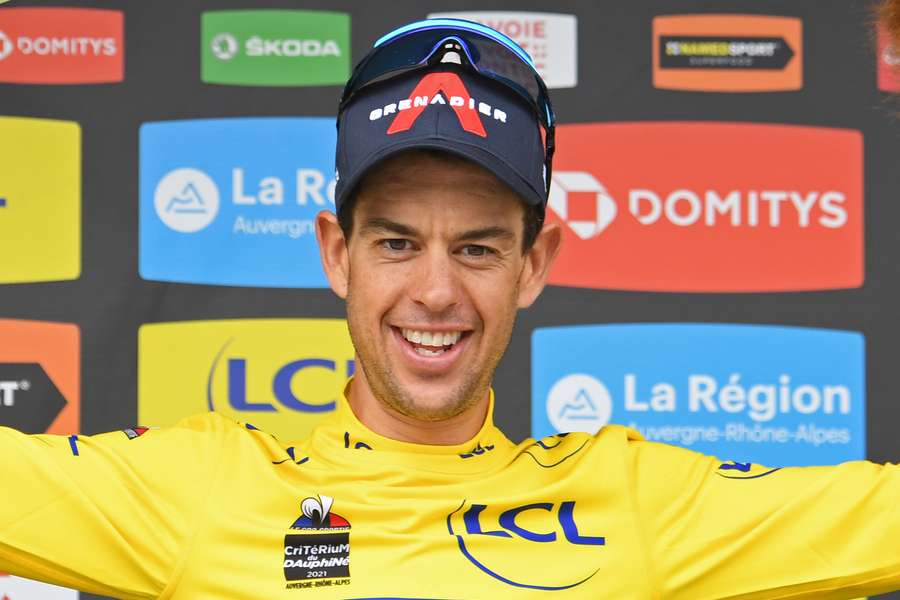 Australia's Richie Porte celebrates his overall leader's yellow jersey on the final day of the 73rd edition of the Criterium du Dauphine in 2021.