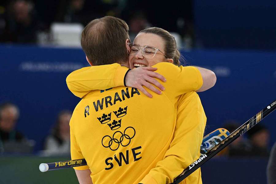  Rasmus Wranaa of Sweden and Isabella Wranaa of Sweden celebrate winning against Bruce Mouat of Britain and Jennifer Dodds of Britain